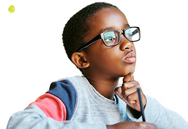 A boy with glasses lost in thought